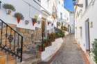 Casares, Malaga, Andalusia, Spain. A narrow alley. Art Print
